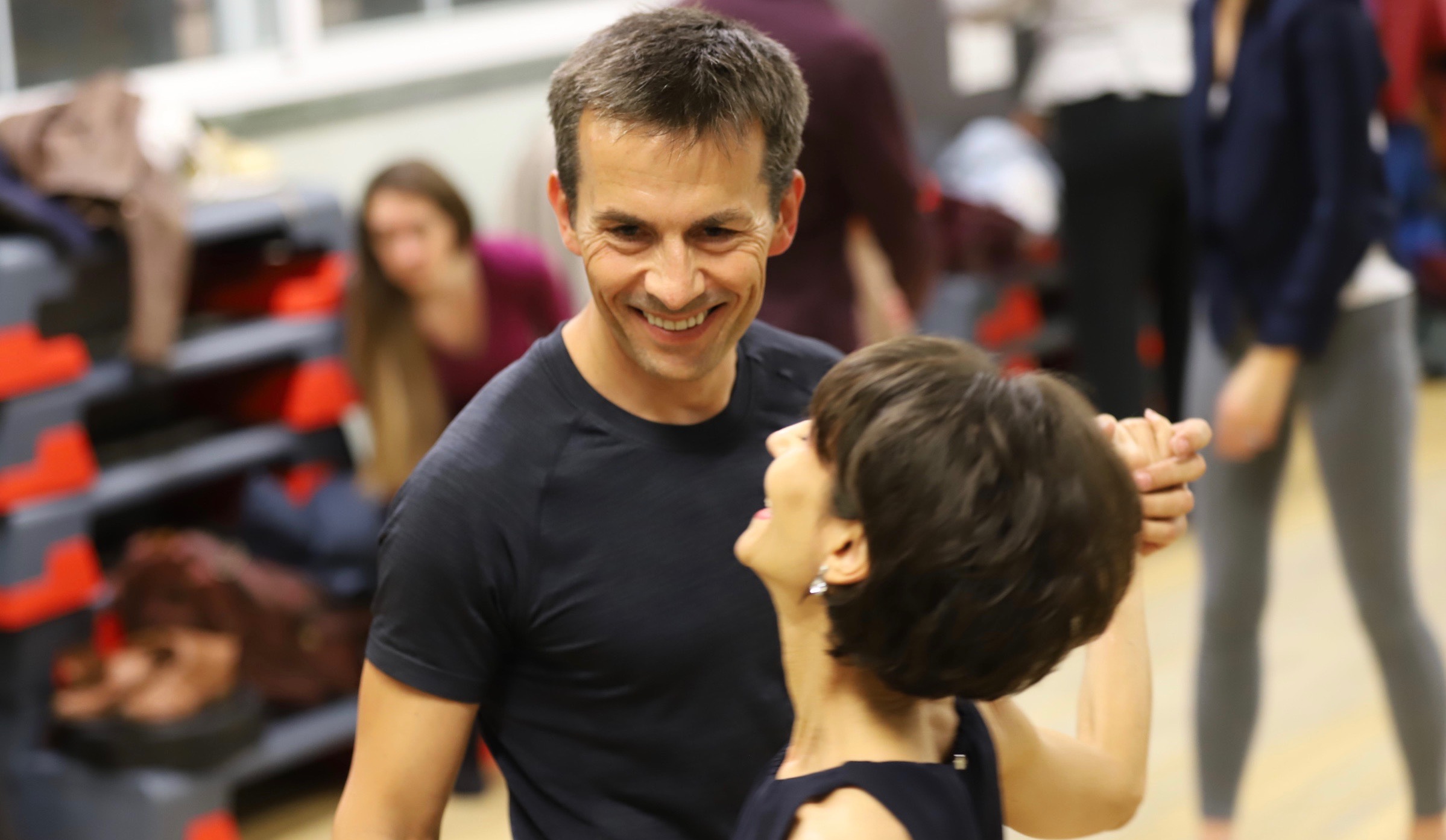 Argentine tango students enjoying a class