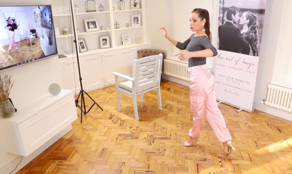 Kim demonstrating tango steps online