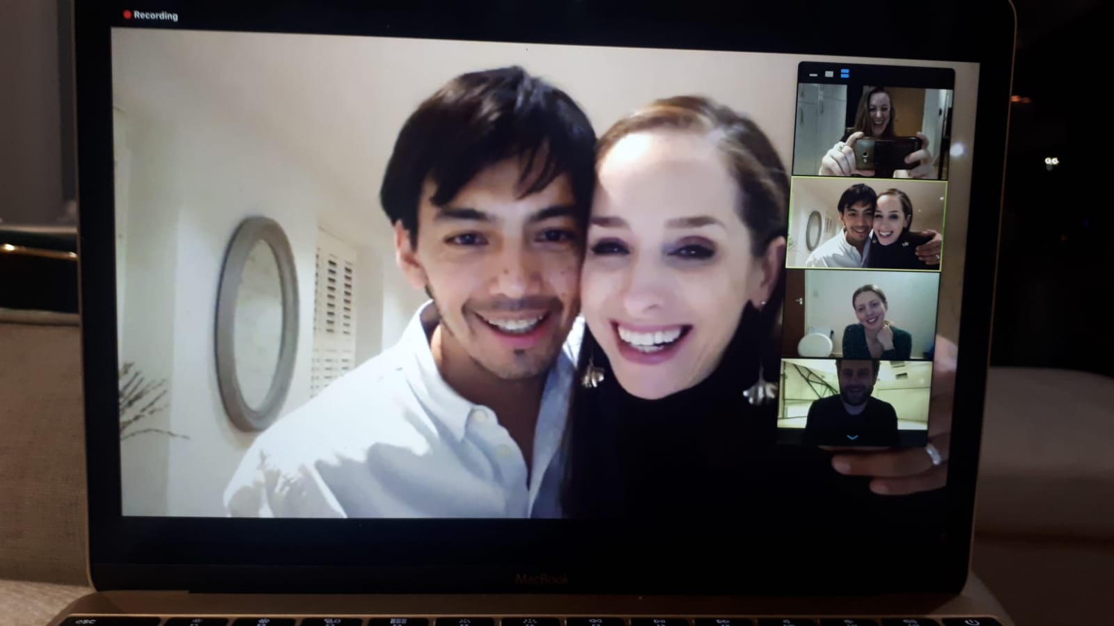 tango teachers smiling through a computer screen