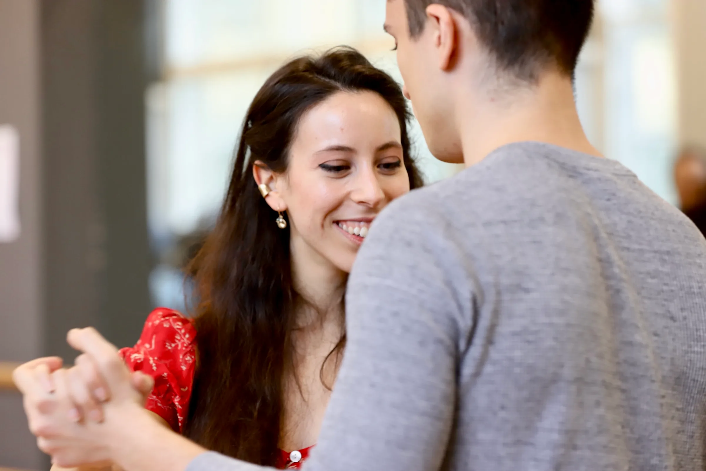 student enjoying a tango lesson