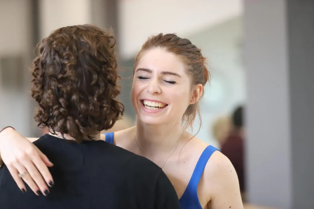 happy student embracing her partner
