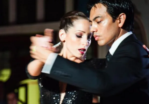 tango dancers preparing for out of axis movement