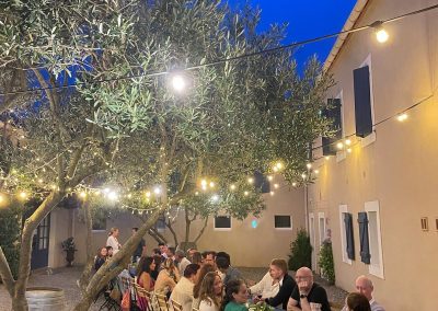 farewell dinner under night sky with fairylights