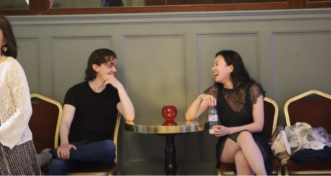 two tango students socialising